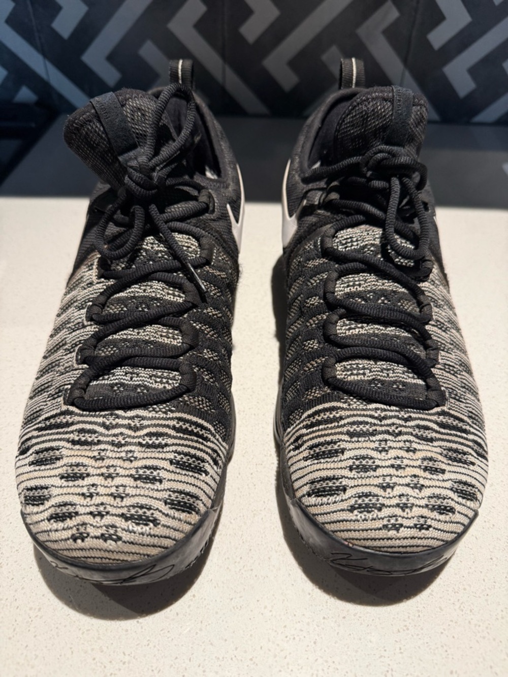 Nike Black and Cream Flyknit High-Top Sneakers